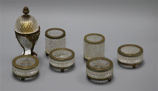 A collection of brass/glass mounted salts and desk tidies